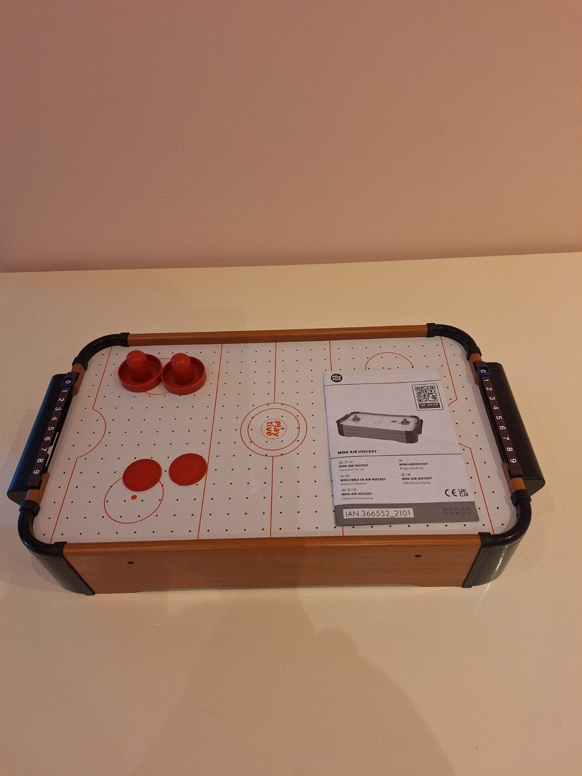 Mini air hockey, Ophalen