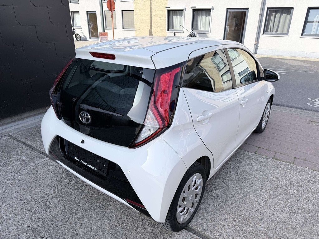 Toyota Aygo 1.0 I EDITION | Carplay | Cruise | Achteruitrijc, Auto's, Toyota, 4 zetels, Stof, Gebruikt, Overige kleuren