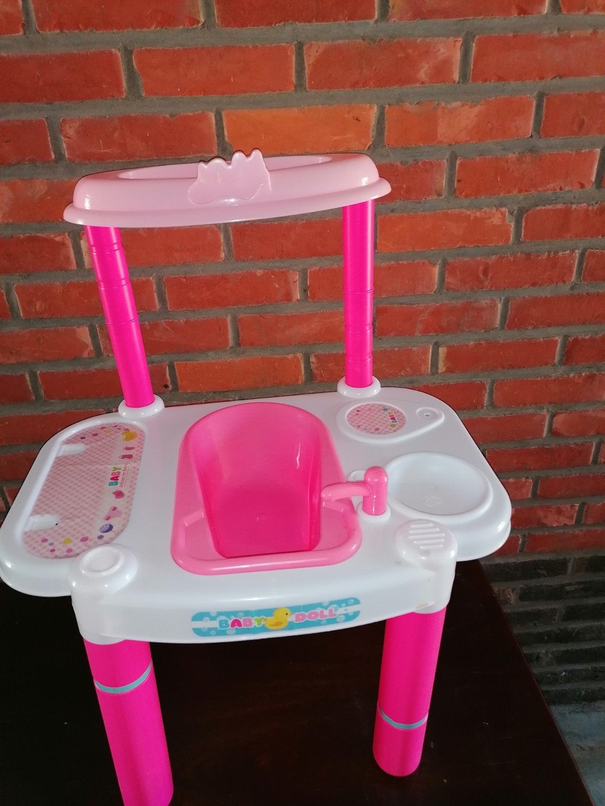 Verzorgingstafel/badje voor poppen, Ophalen