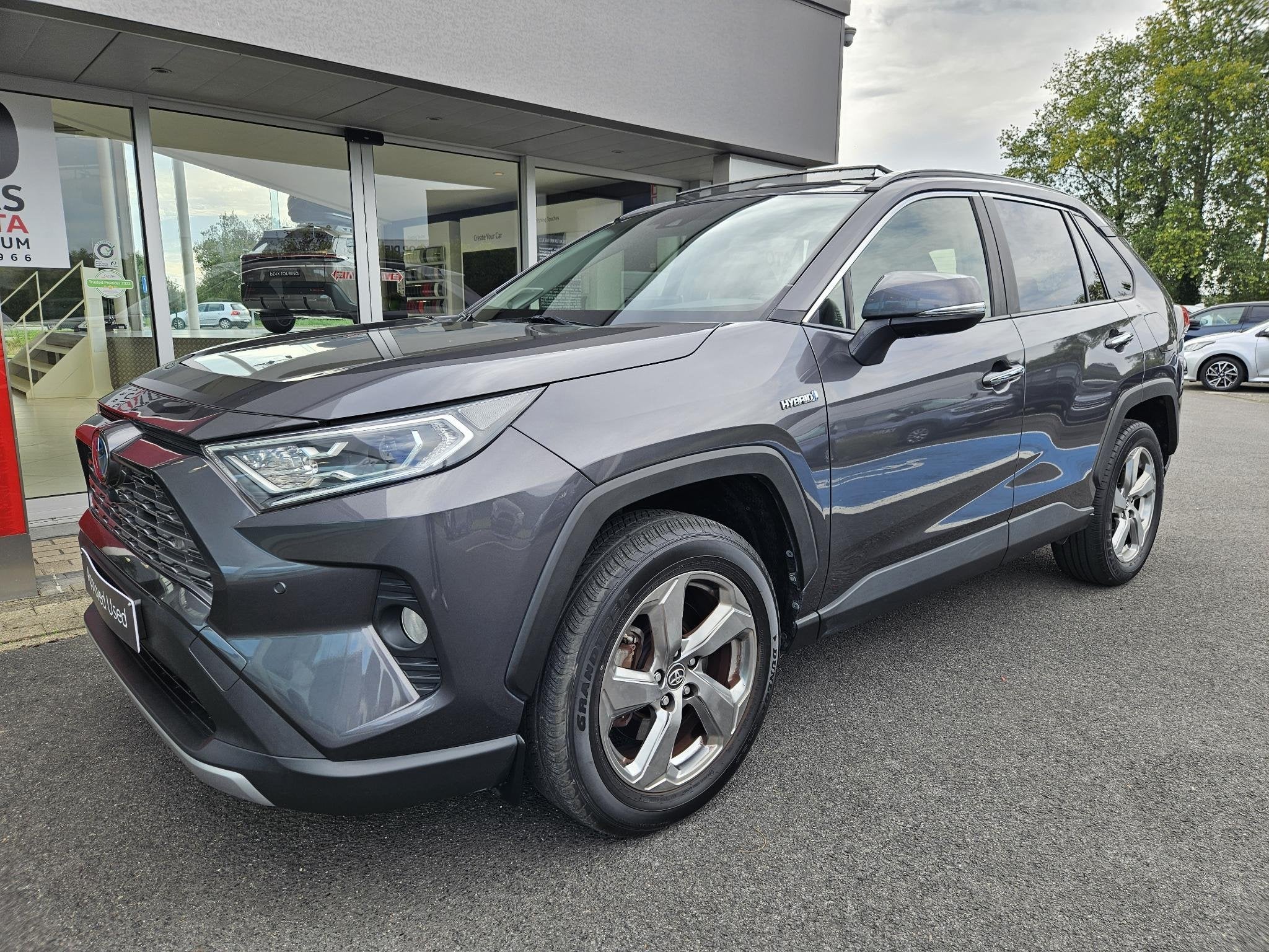 Toyota RAV4 2.5 VVT-i Hybrid Premium E-CVT, Auto's, Stof, Gebruikt, https://public.car-pass.be/vhr/553f157a-8182-4c4b-a32a-070106c6f705