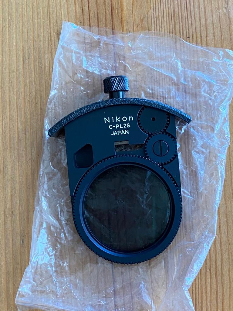 Nikon C-PL2S filtre polarisant insérable *neuf, Enlèvement ou Envoi, Comme neuf, Filtre polarisant