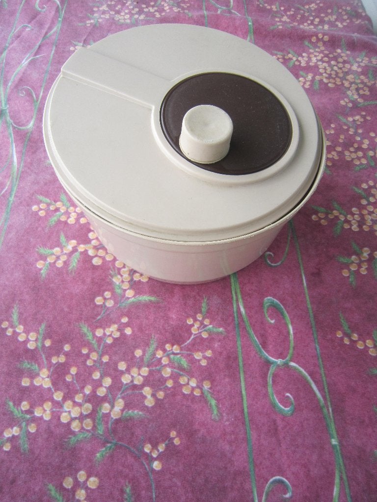 sla droger (tuperware), Enlèvement