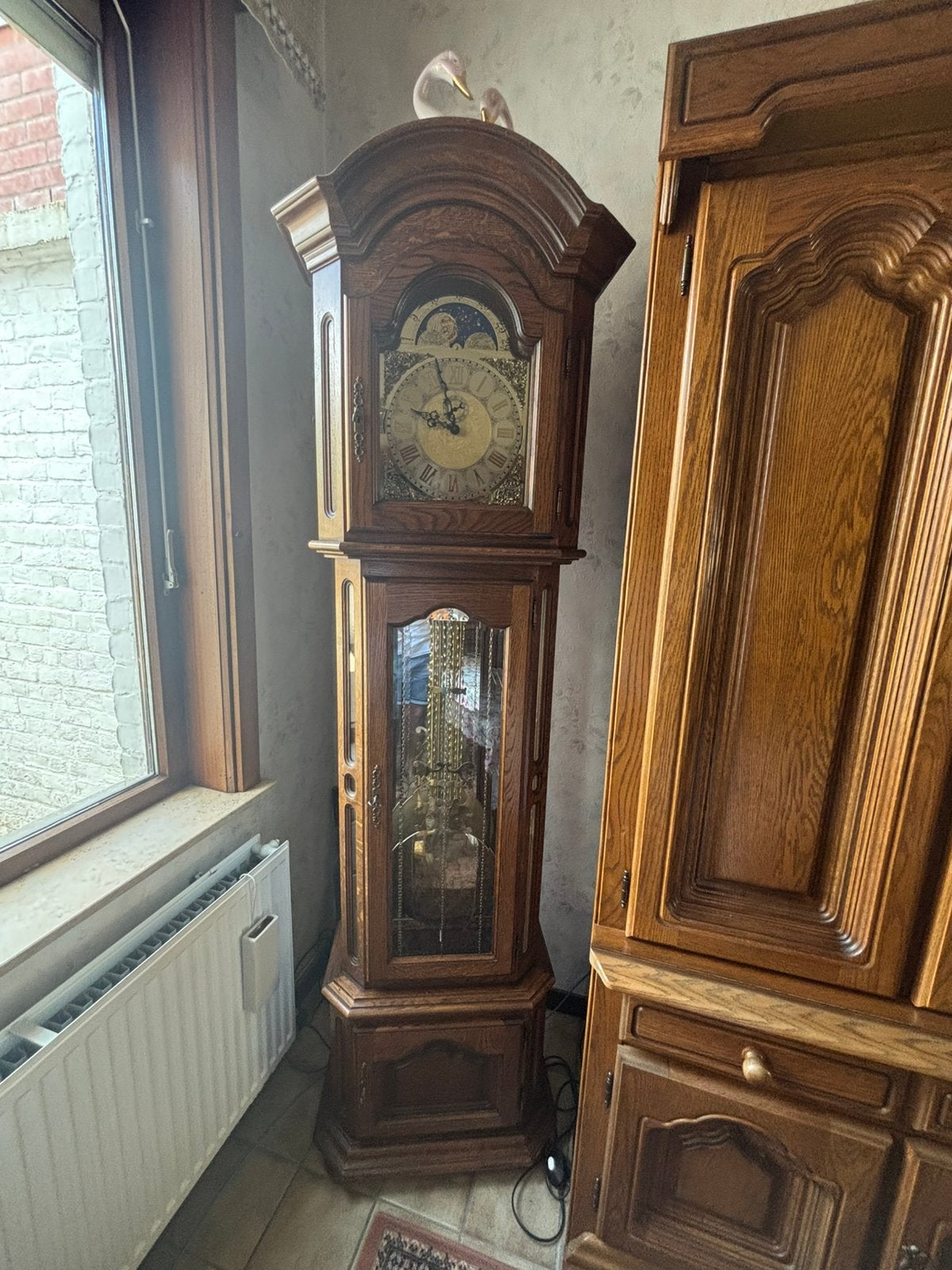 Staande klok, Ophalen