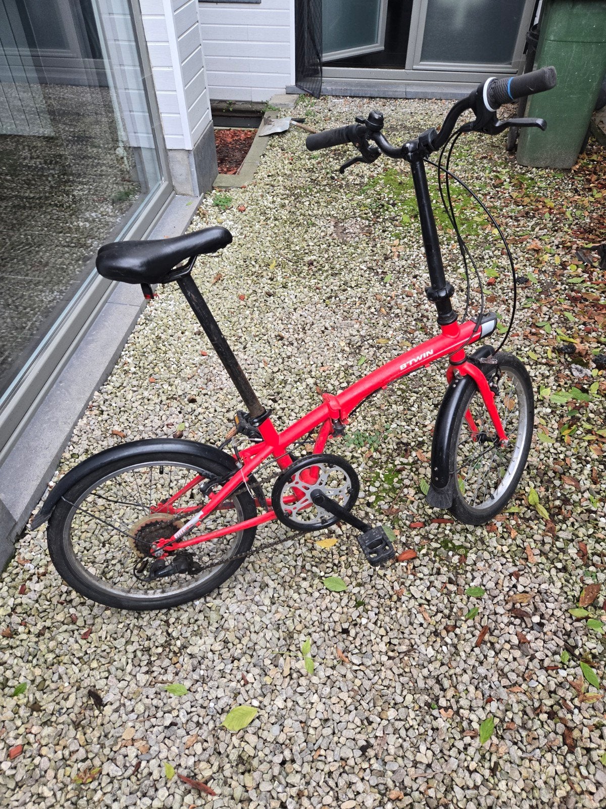 plooifiets Btwin, Ophalen