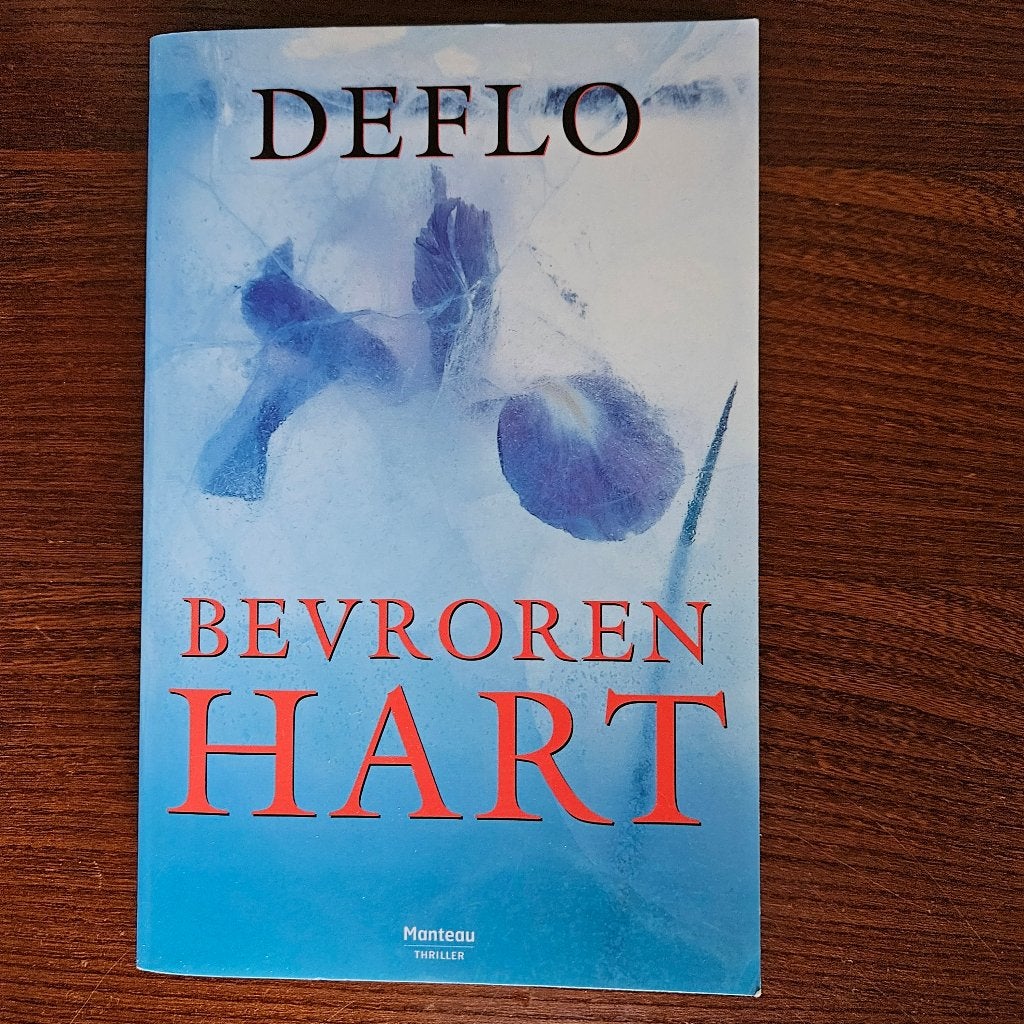 thrillers Bevroren hart en Onschuldig van Luc Deflo, Ophalen of Verzenden, Zo goed als nieuw