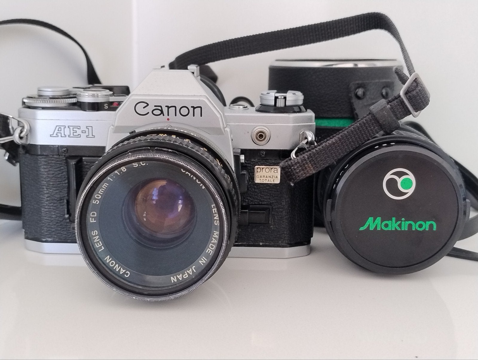 Appareil photo Canon AE1 avec objectif FD 50 mm 1:1.8 S.C +, Enlèvement ou Envoi, Utilisé, Reflex miroir, Canon