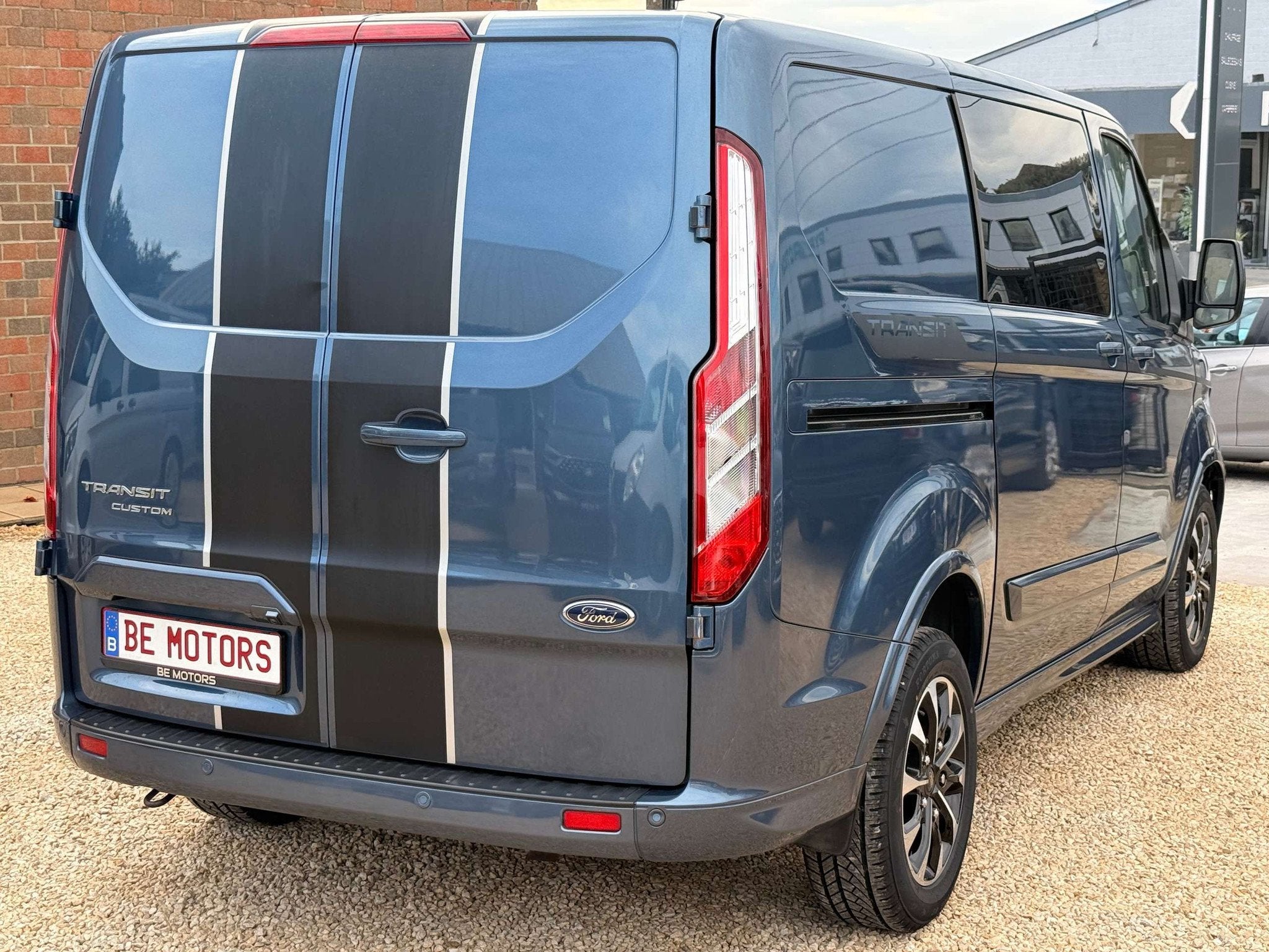 Ford Transit Custom Sport 2.0 TDCi L1H1 TVAC 185CV 5PL DOUBL, Auto's, Gebruikt, Blauw, Bedrijf, 136 kW