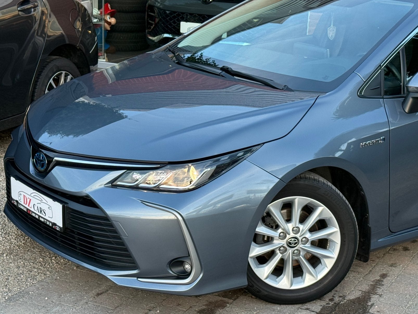 TOYOTA COROLLA HYBRID 1.8I 98PK |NAVI | CAMERA | ACC | LED, Auto's, Stof, 1440 kg, 4 cilinders, 72 kW