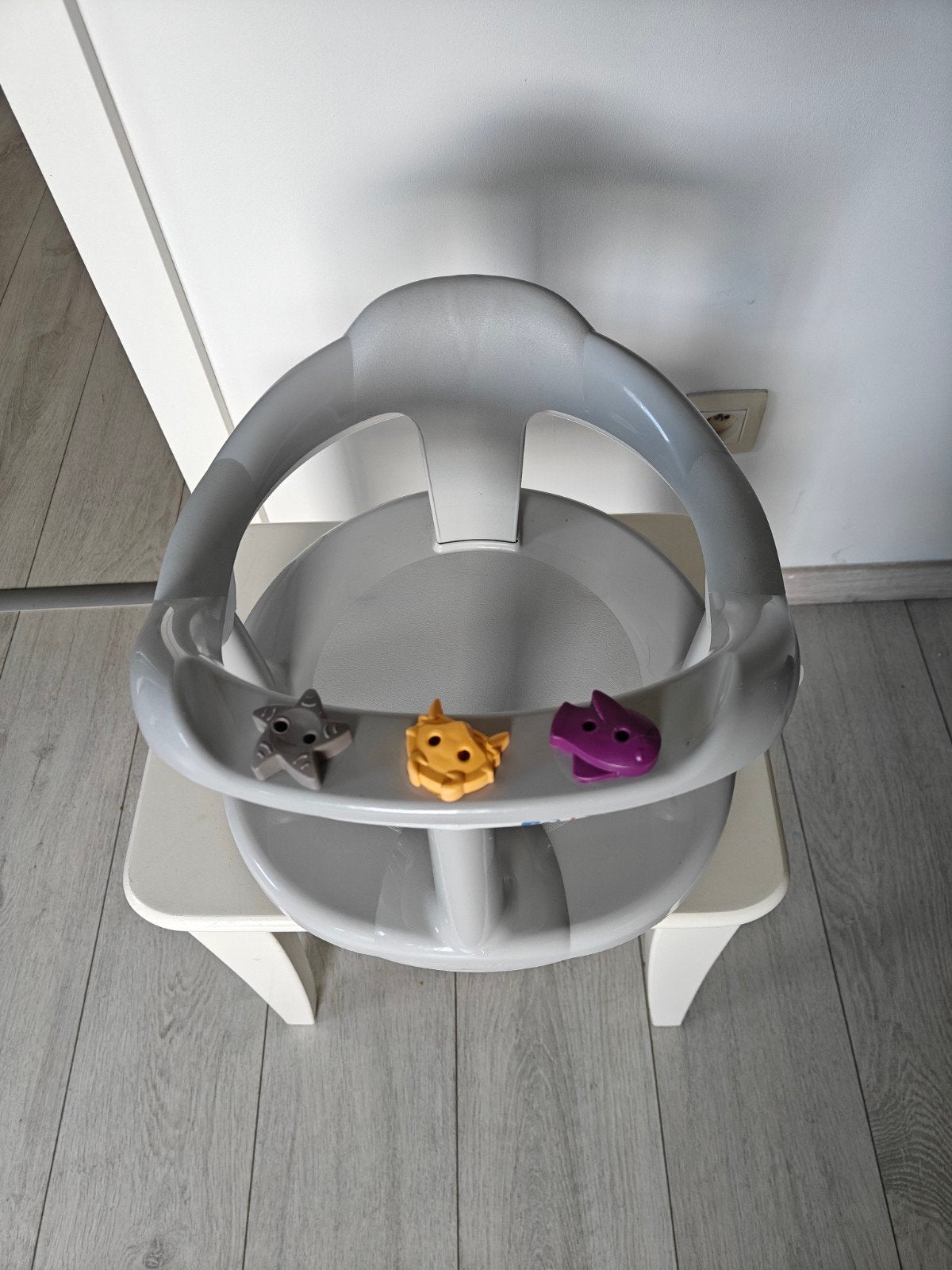 kinderstoel voor in bad, Ophalen