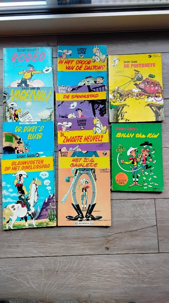 10 oude strips van Lucky Luke., Gelezen, Ophalen of Verzenden, Morris, Meerdere stripboeken