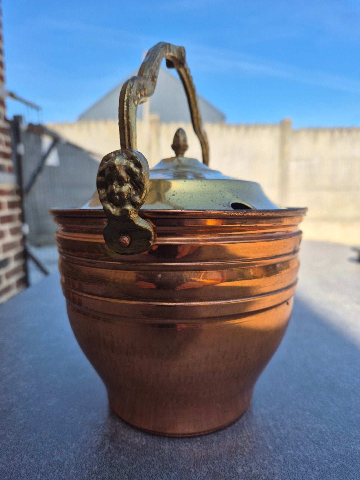 Koperen pot, Ophalen
