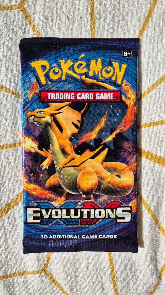 Evolutions XY booster, Ophalen of Verzenden, Nieuw, Booster