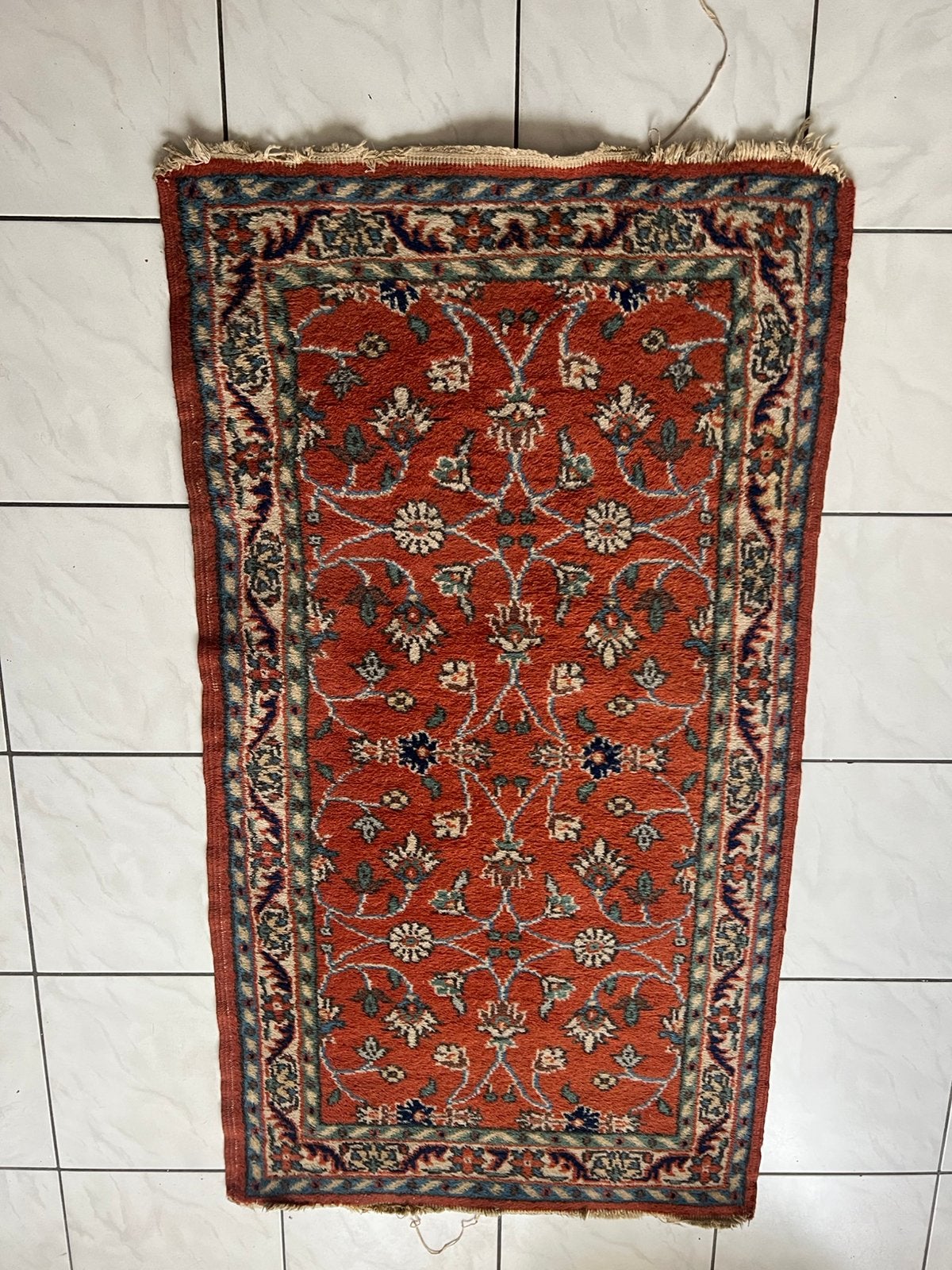Tapis d’orient vintage, Enlèvement