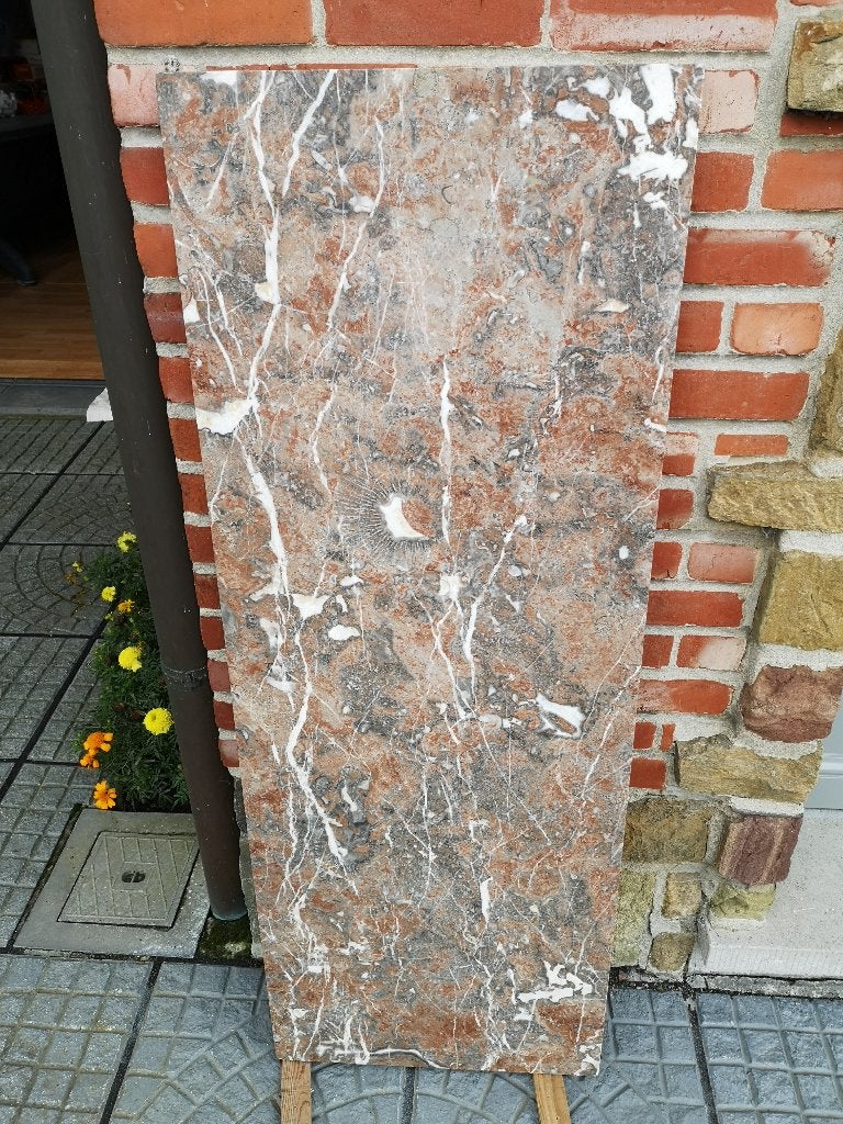 Rood/roze gemêleerd marmer, Ophalen