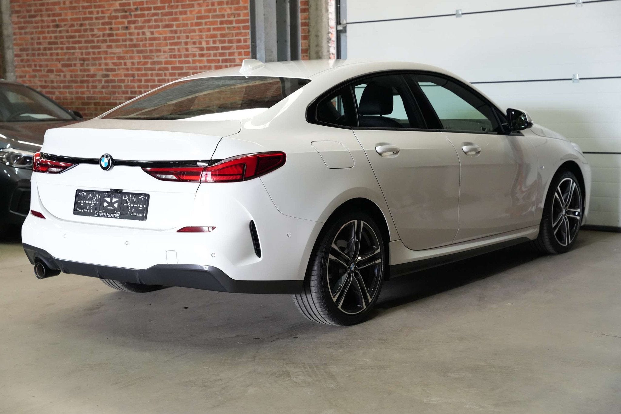 BMW 218 iA Gran Coupe Automaat M Sportpakket Garantie Benz, Automaat, Gebruikt, 1905 kg, Wit