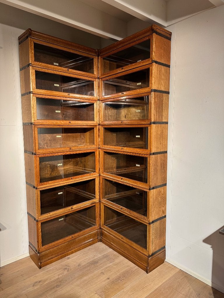 Antieke eiken Globe Wernicke boekenkast in hoekopstelling, Ophalen of Verzenden