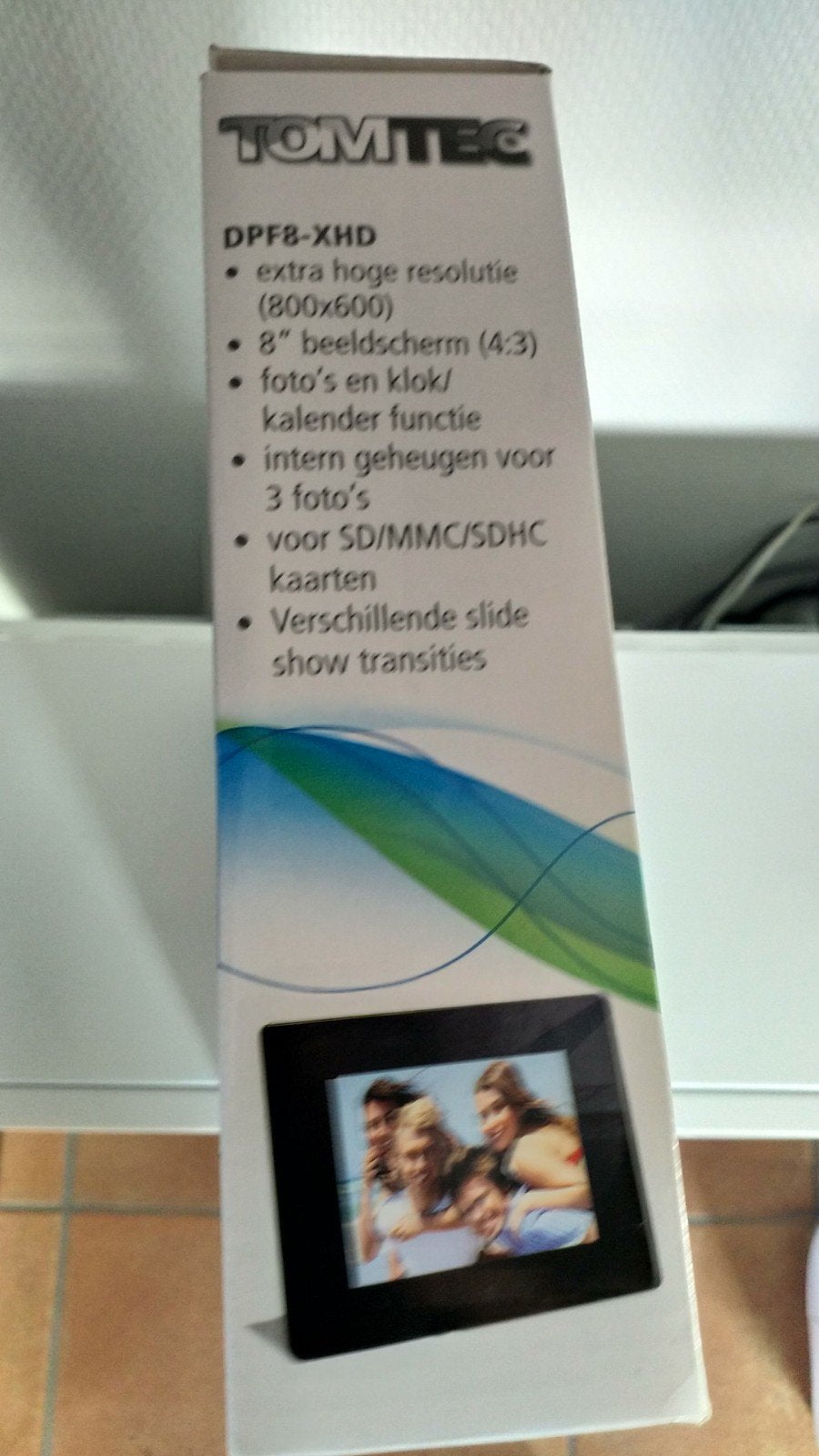 Nieuwe Tom Tec digitale fotolijst, Ophalen