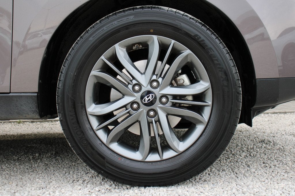 Hyundai ix35 1.6GDi Go Ultimate 135PK *LEDER*OPENDAK*CAM*NAV, Voorwielaandrijving, Gebruikt, Zwart, 149 g/km