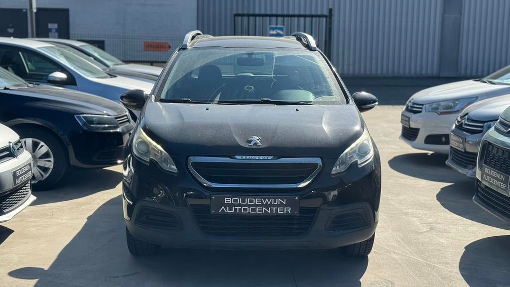Peugeot 2008 1.2Benzine 2015 150.xxxkm 1Jaar Garantie, Auto's, Peugeot, Voorwielaandrijving, Stof, Zwart, Zwart
