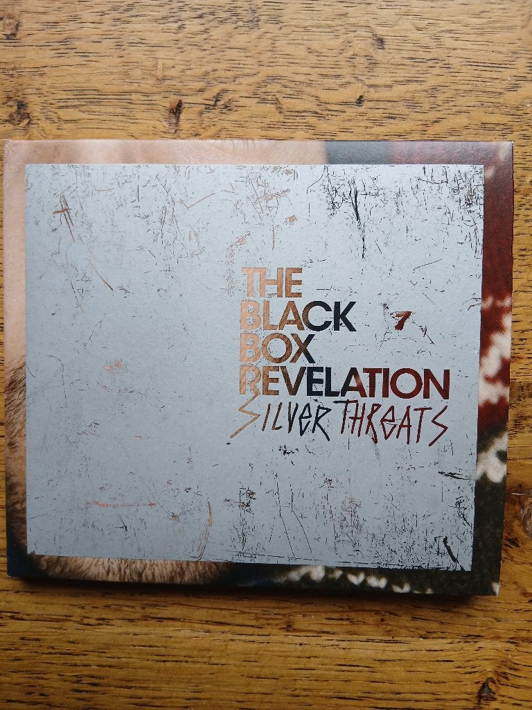 CD Black Box Revelation : Silver Threats, Ophalen