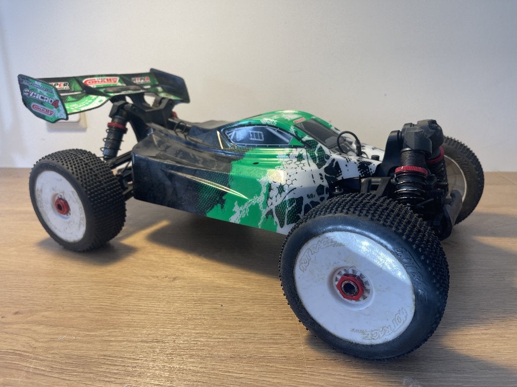 Corally Synchro 4 + Lot de pièces, Enlèvement ou Envoi, Échelle 1:8, Voiture off road, Utilisé