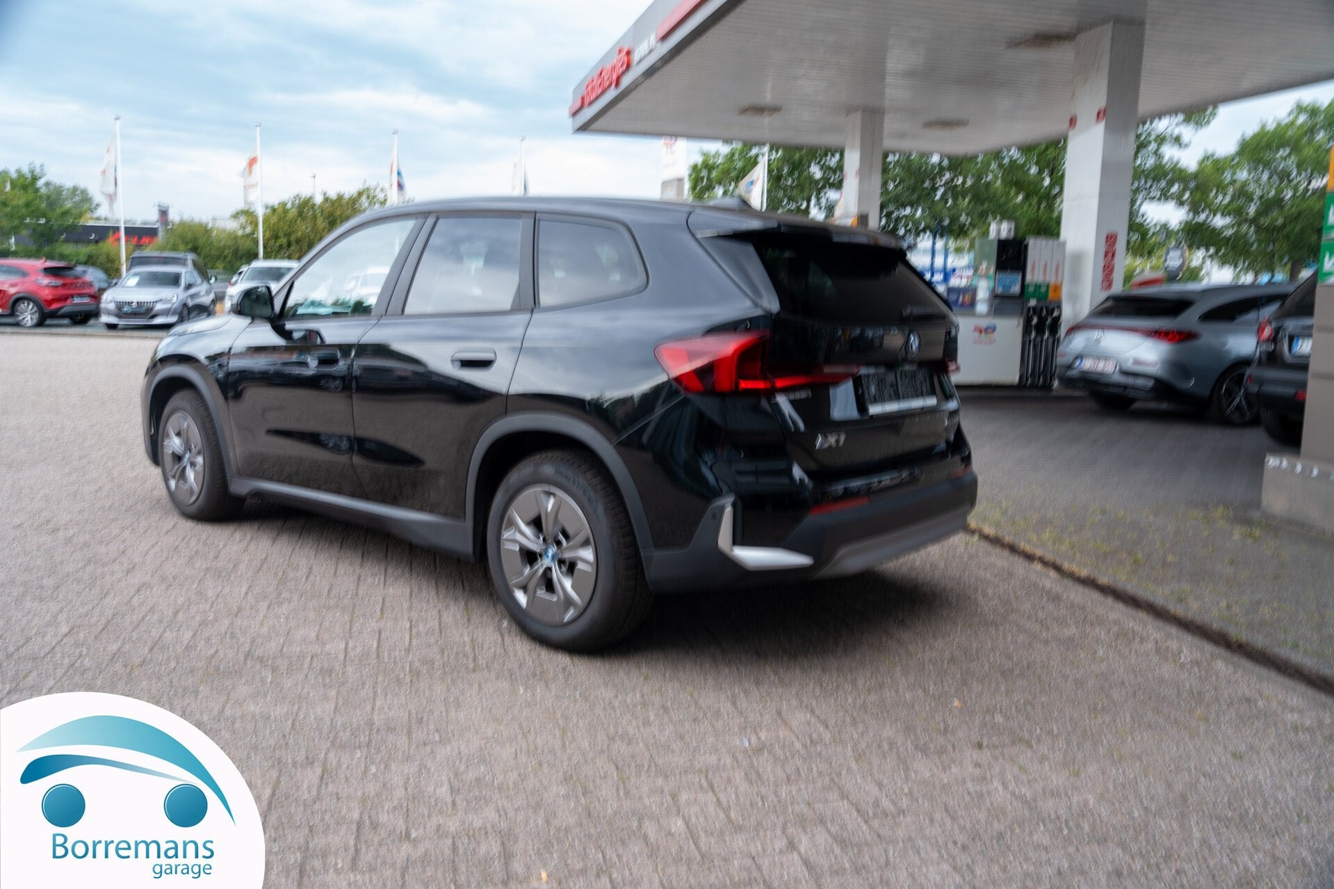 BMW iX1 xDrive30 Elektrisch | SOH 99% | Leder | Camera | Ca, Auto's, BMW, Beige, 0 kg, Zwart, 5 zetels