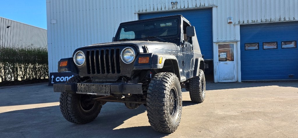 Wrangler TJ 2001 spotprijs!, Auto's, Stof, 4 cilinders, Blauw, Particulier