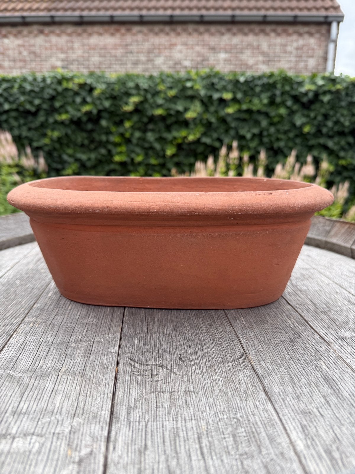 Langwerpige terracotta bloempot, Tuin en Terras, Bloempotten, Ophalen, Zo goed als nieuw, Terracotta