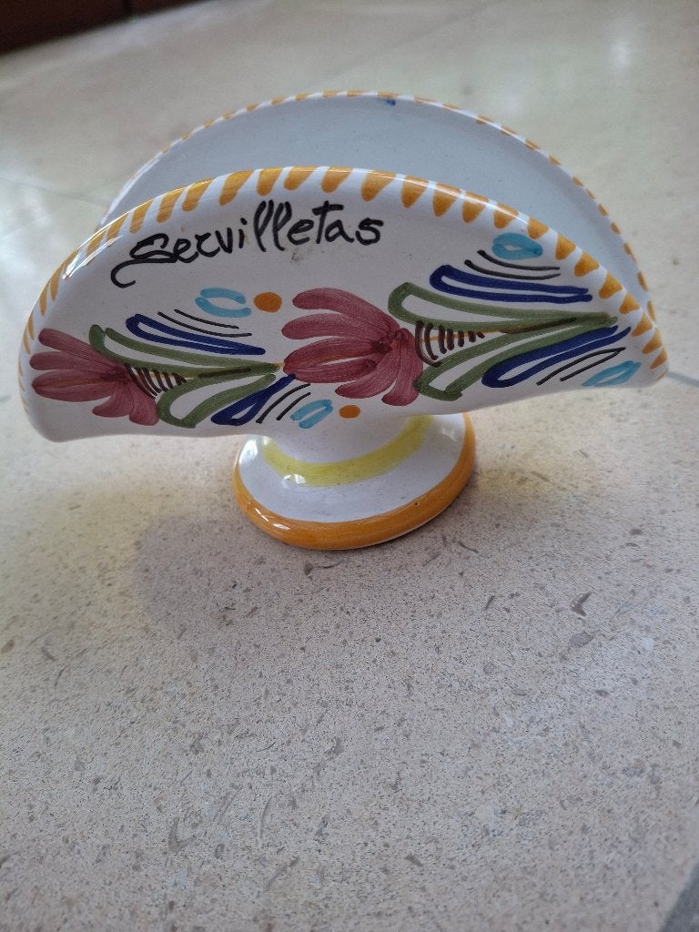 Spaanse servettenhouder, Ophalen