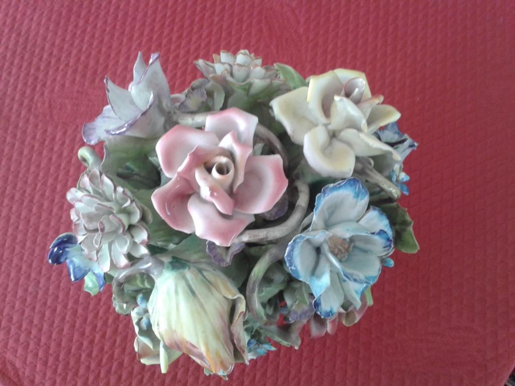 Breekbaar stenen beeld ('vaas met bloemen'), Ophalen