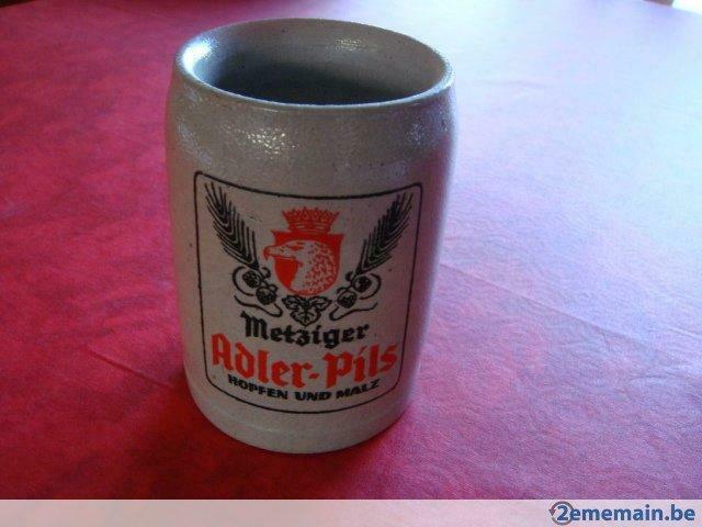 Chope ancienne. Marque: "Adler-Pils Metziger".  25Cl., Enlèvement ou Envoi, Utilisé