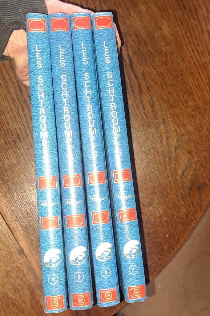 Lot schtroumpfs rombaldi tome 1-2-3-4, Livres, Plusieurs BD, Enlèvement ou Envoi, Comme neuf, Peyo