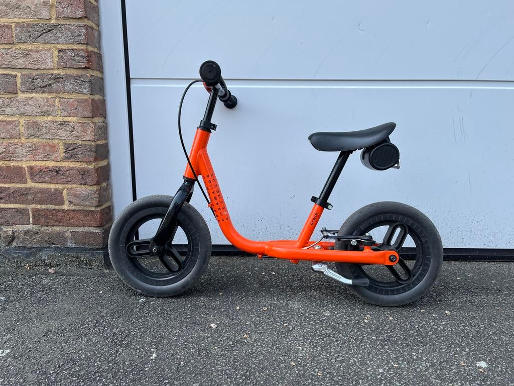 BTWIN RunRide 500 loopfiets 10 inch oranje, standaard, riem, Ophalen, Zo goed als nieuw, Velgrem, Minder dan 16 inch