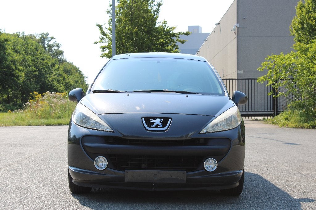 Peugeot 207 SW 1.4i 16v Trendy, Auto's, Stof, 140 g/km, Zwart, 4 cilinders