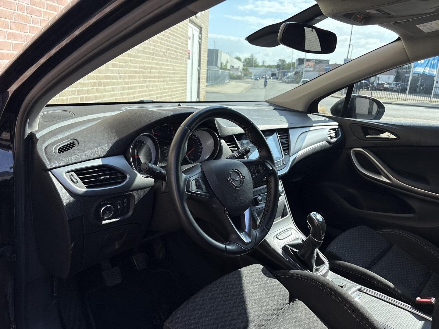 Opel Astra Sports Tourer 1.0 Business+ | climatisation | Cru, Autos, Electronic Stability Program (ESP), Achat, Entreprise, Noir