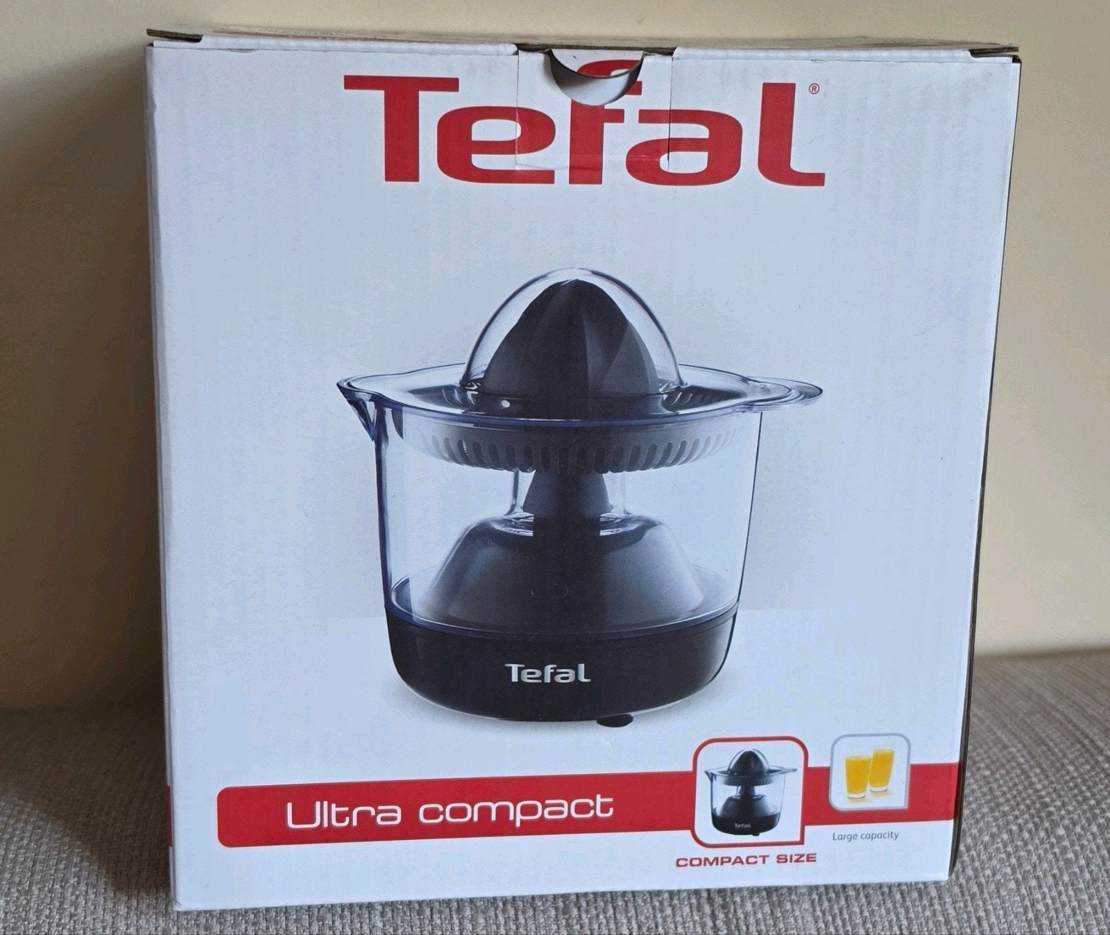 Citruspers Tefal, Ophalen
