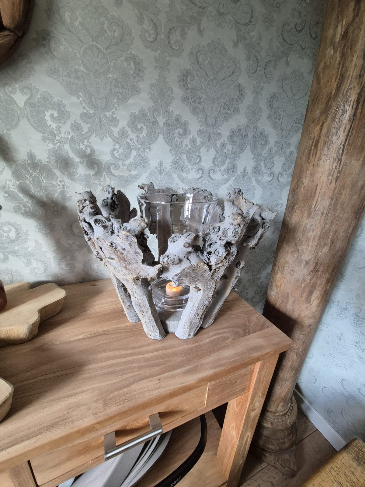 Bougeoir en bois flotté, Enlèvement