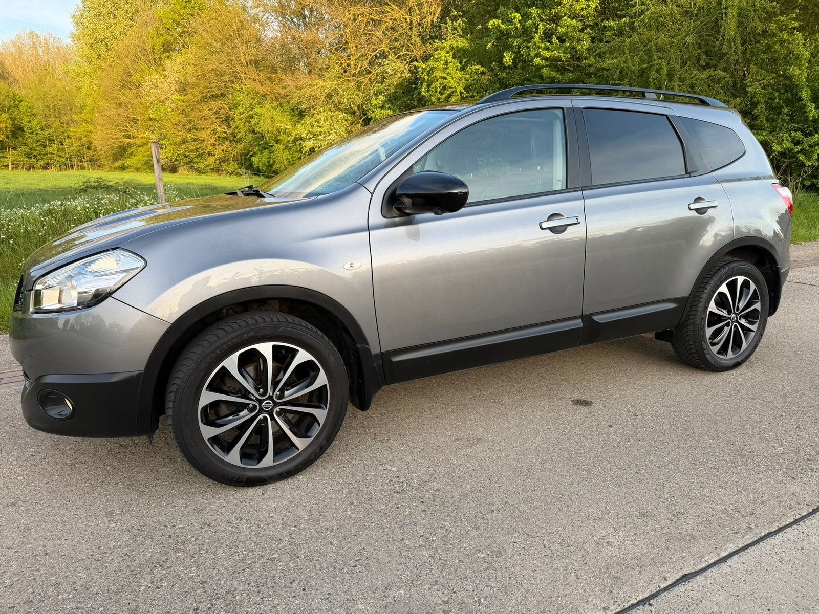 Nissan qashqai heel proper 7 plaats benzine, Auto's, Nissan, Voorwielaandrijving, Euro 5, Zwart, Leder en Stof