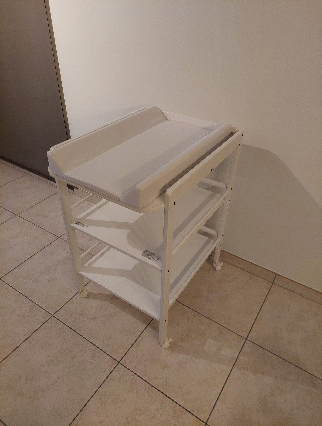 Verschoontafel met kussen, Enlèvement