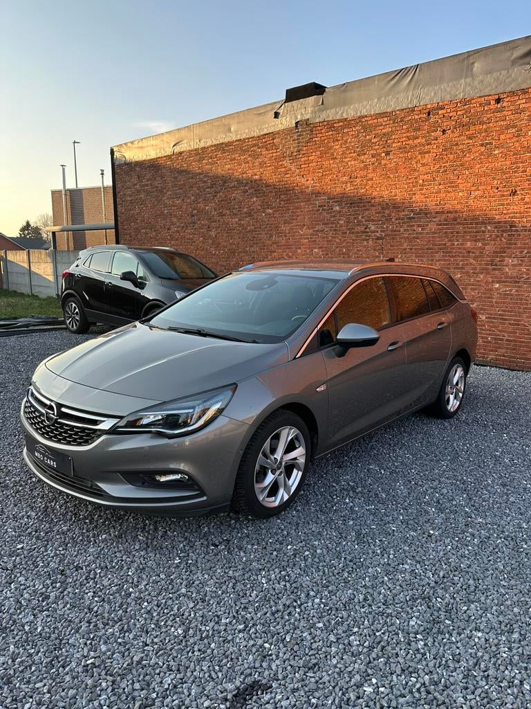Opel Astra Sports Tourer + 1.4 Turbo| CAM, CRUISE, DODE HOEK, Auto's, Opel, Voorwielaandrijving, Stof, https://public.car-pass.be/vhr/706b0d25-cb9a-4dca-b3bf-1f9ad259e24c