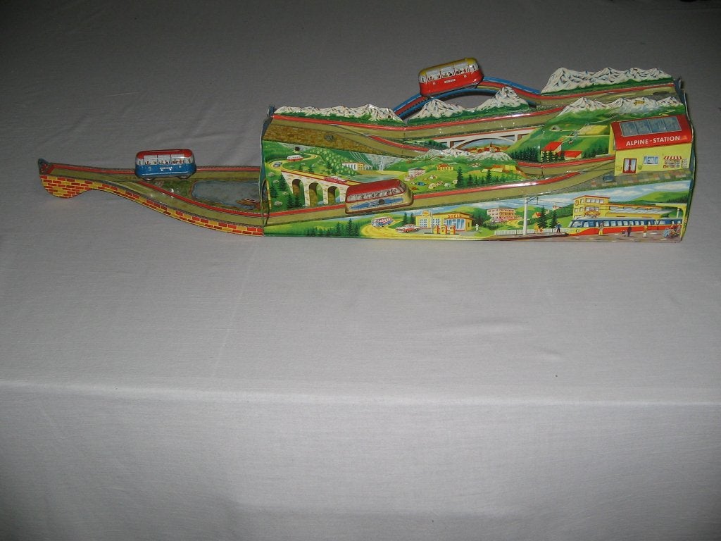 Retro speelgoed blikkenbaan met busjes van de jaren 50, Ophalen