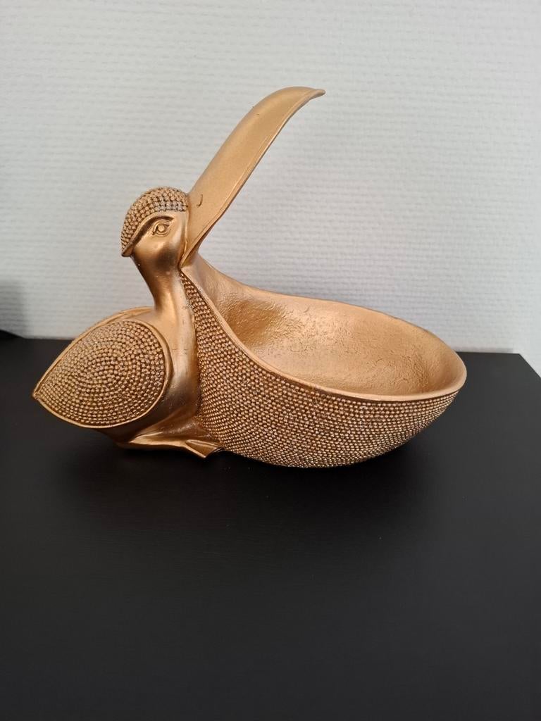Piliakaan beeldje schaaltje, Ophalen