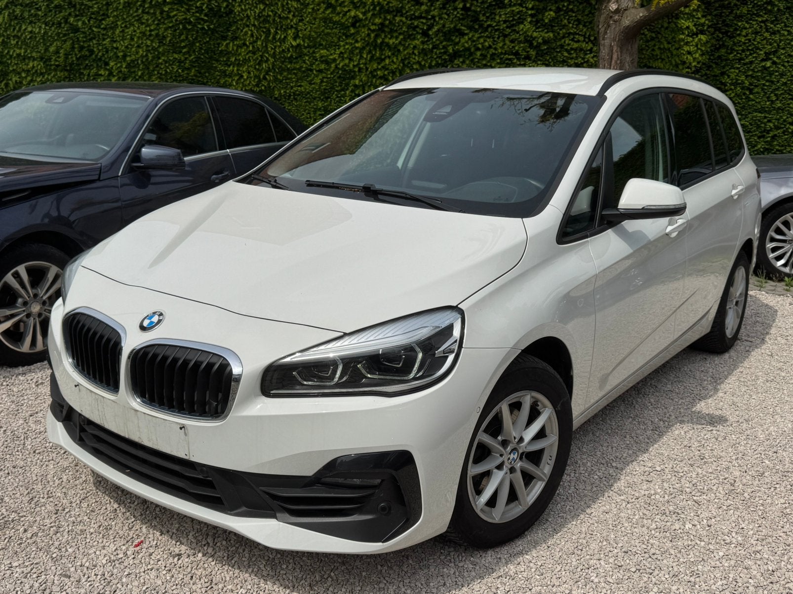 BMW 216i Gran Tourer - 2020*69000KM*ZEER PROPER*GARANTIE!, Auto's, Dealer onderhouden, Euro 6, Wit, Bedrijf