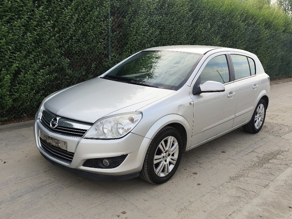 Opel Astra 1.4i Cosmo, Auto's, Voorwielaandrijving, Zwart, 4 cilinders, Leder en Stof