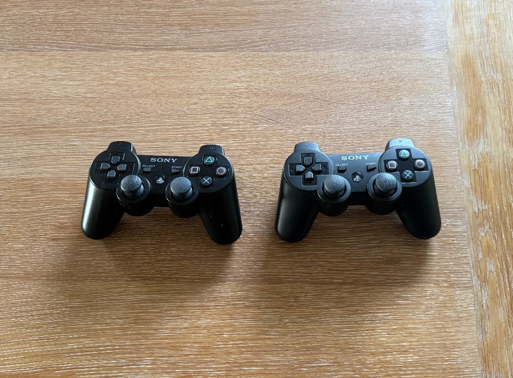 2x Sony PS3 DualShock 3 Controller, Ophalen of Verzenden, Zo goed als nieuw