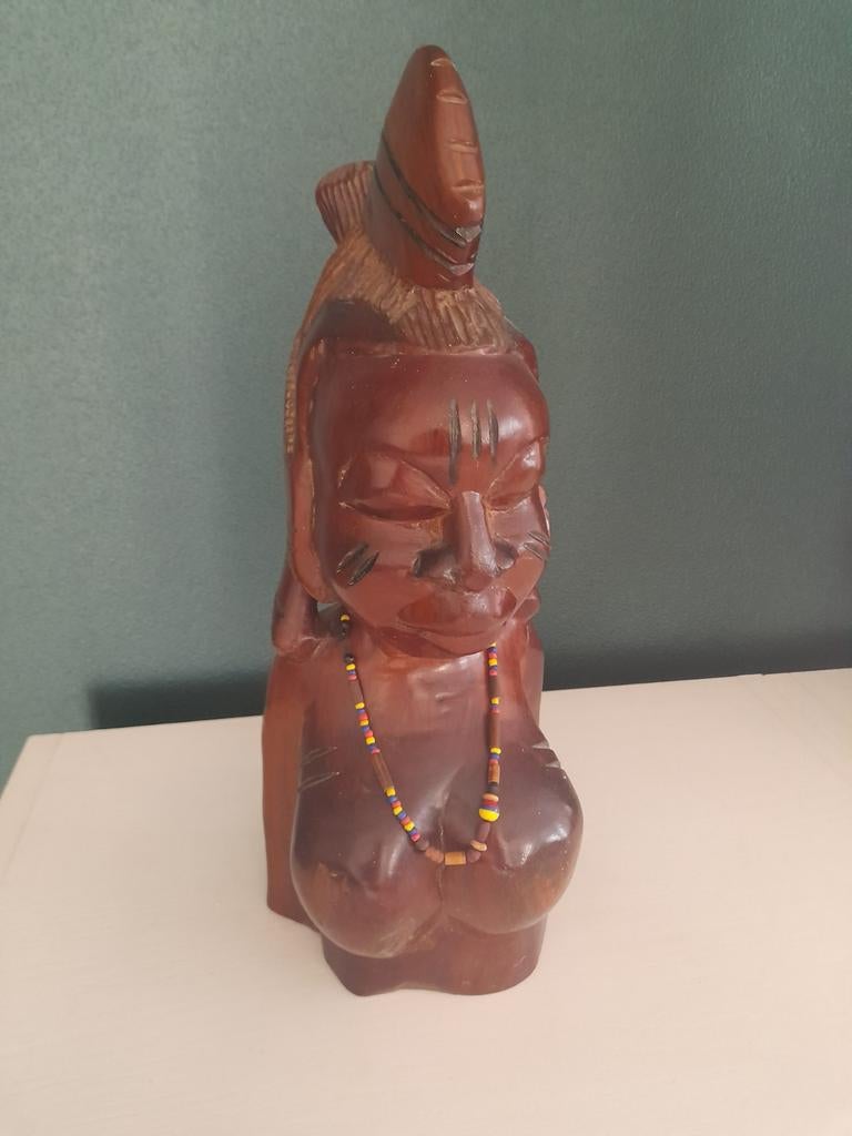 Houten beeld, Ophalen