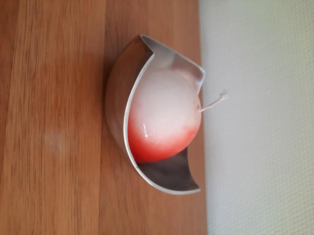 kom met kaars, Ophalen