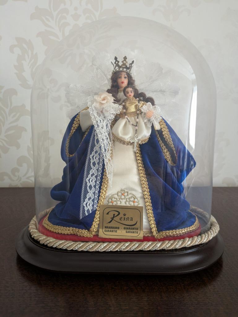 Mariabeeld onder stolp, Ophalen