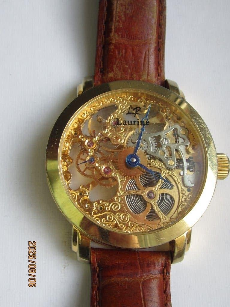 Montre Laurine, Bijoux, Sacs & Beauté, Montres | Hommes, Montre-bracelet, Autres marques, Enlèvement ou Envoi, Cuir