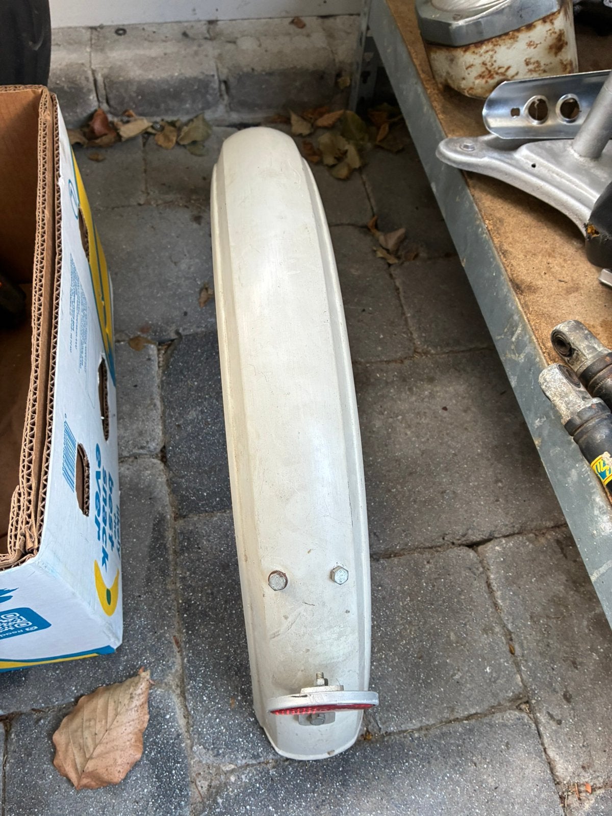 Achterspatbord, Enlèvement